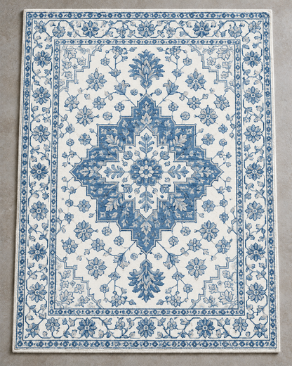 H04 Heriz rug from above, a stepped soft blue medallion on a pure white field with a white and blue border