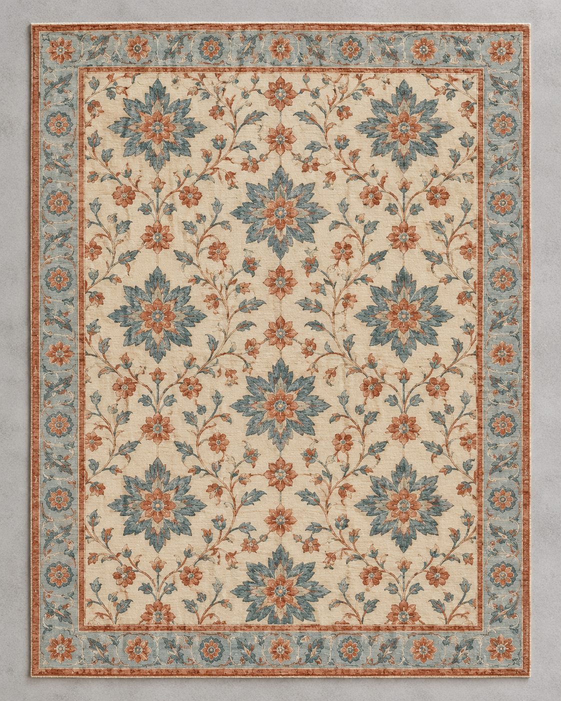 H06 Mughal Star rug from above, slate-blue and terracotta star-flowers on an ivory field with a duck-egg border